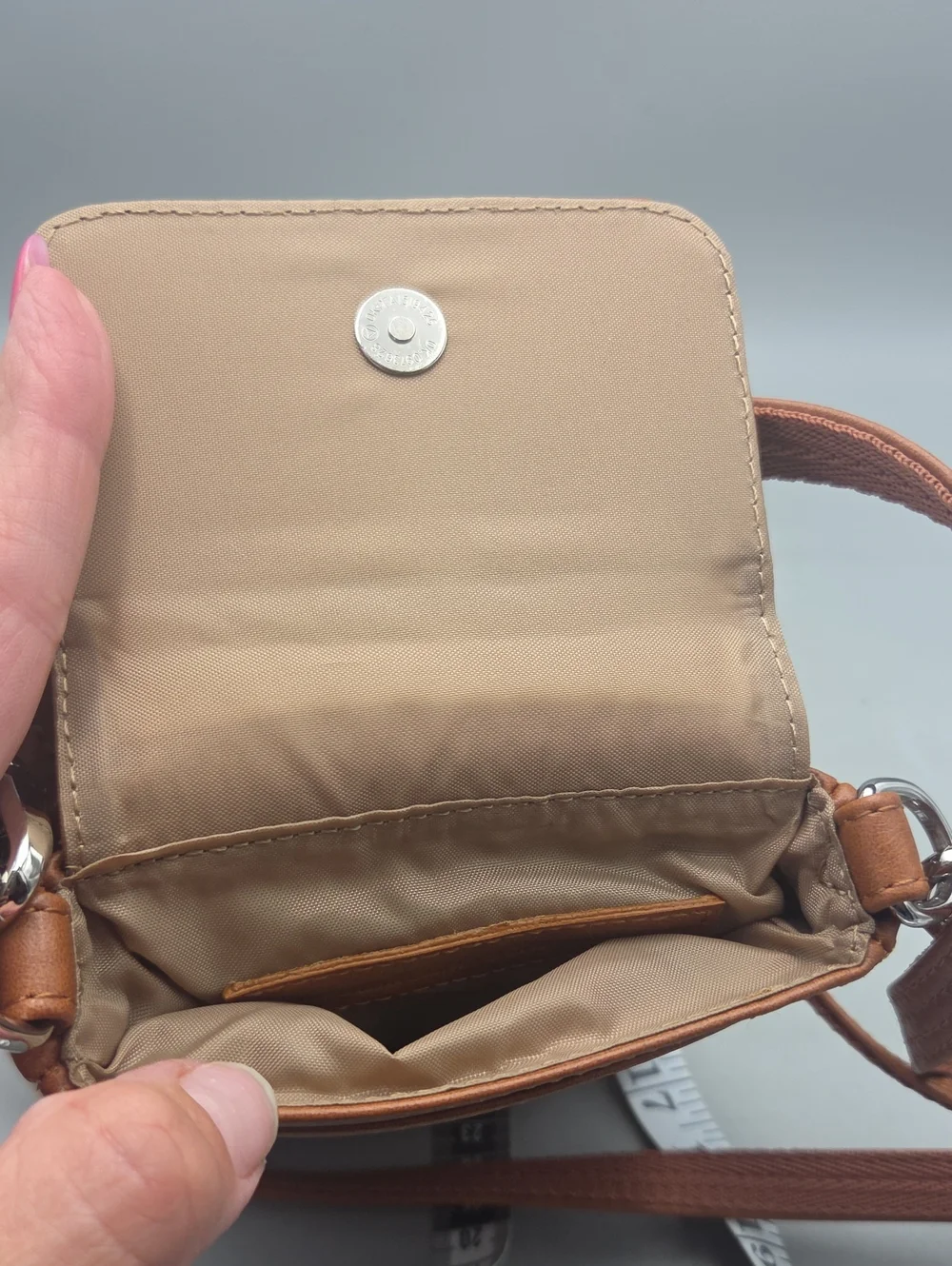 Hammacher Schlemmer • Wearable crossbody leather wallet